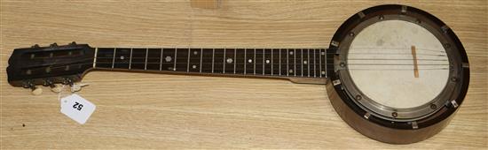 W. Temlett. A five string zither banjo, cased
